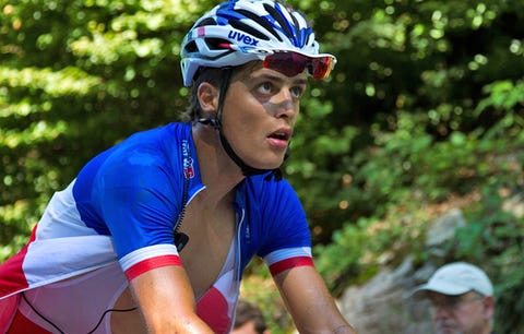 cyclist looking scared before a climb