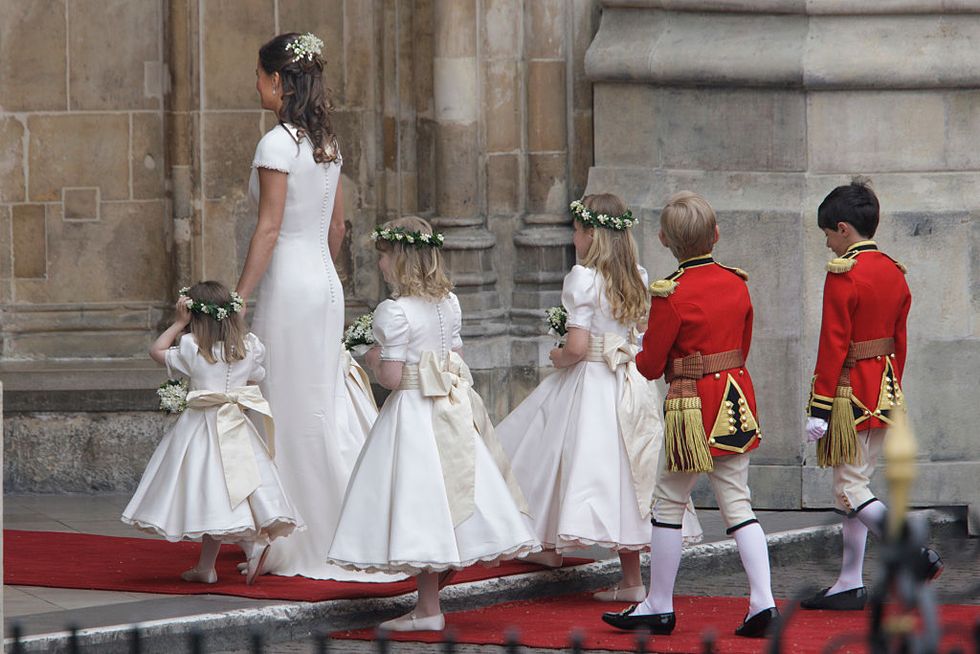 pippa middelton, sister of the bride kate middleton, arrives to the wedding of britains prince william and kate middleton, with young bridesmaids, in central london photo by brooks kraft llccorbis via getty images