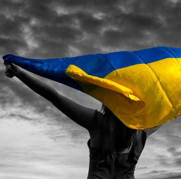 woman holding the ukrainian flag