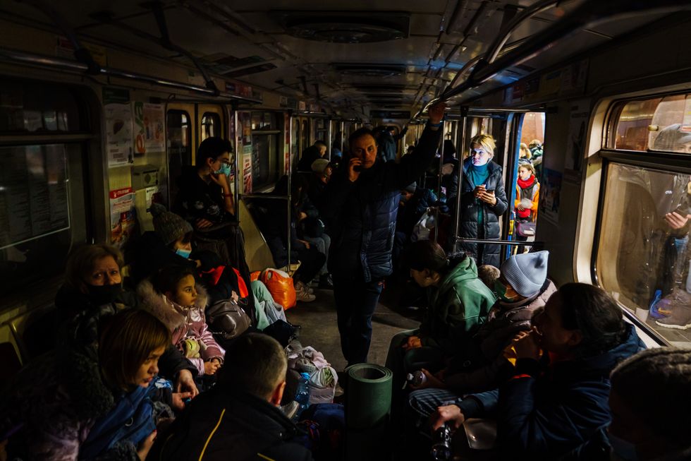 kharkiv, ukraine    february 24, 2022 hundreds of people seek shelter underground, on the platform, inside the dark train cars, and even in the emergency exits, in metro subway station as the russian invasion of ukraine continues, in kharkiv, ukraine, thursday, feb 24, 2022 marcus yam  los angeles times