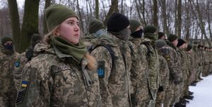 kyiv, ukraine   january 22 civilians, including tatiana l, 21, a university veterinary medicine student who is also enrolled in a military reserve program, participate in a kyiv territorial defence unit training on a saturday in a forest on january 22, 2022 in kyiv, ukraine across ukraine thousands of civilians are participating in such groups to receive basic combat training and in time of war would be under direct command of the ukrainian military while ukrainian officials have acknowledged the country has little chance to fend off a full russian invasion, russian occupation troops would likely face a deep rooted, decentralised and prolonged insurgency russia has amassed tens of thousands of troops on its border to ukraine photo by sean gallupgetty images