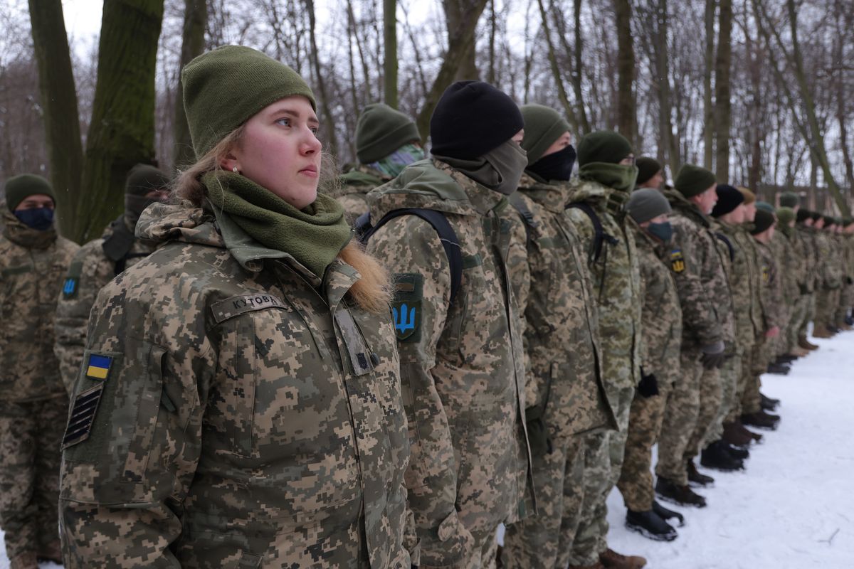 kyiv, ukraine   january 22 civilians, including tatiana l, 21, a university veterinary medicine student who is also enrolled in a military reserve program, participate in a kyiv territorial defence unit training on a saturday in a forest on january 22, 2022 in kyiv, ukraine across ukraine thousands of civilians are participating in such groups to receive basic combat training and in time of war would be under direct command of the ukrainian military while ukrainian officials have acknowledged the country has little chance to fend off a full russian invasion, russian occupation troops would likely face a deep rooted, decentralised and prolonged insurgency russia has amassed tens of thousands of troops on its border to ukraine photo by sean gallupgetty images