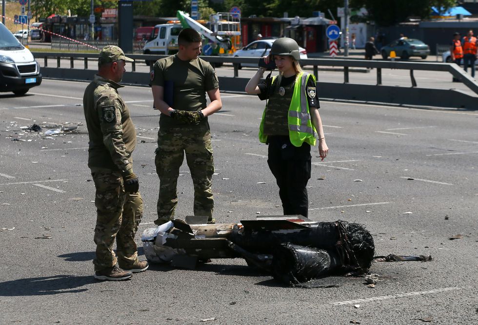 part of a missile landed on a street during a russian missile strike in kyiv