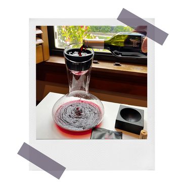 malbec wine being poured into ullo wine purifier