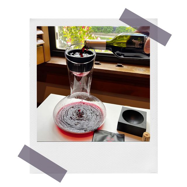 malbec wine being poured into ullo wine purifier