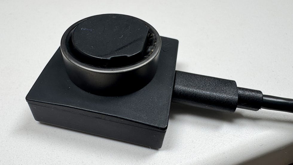 black ring charging on a dock