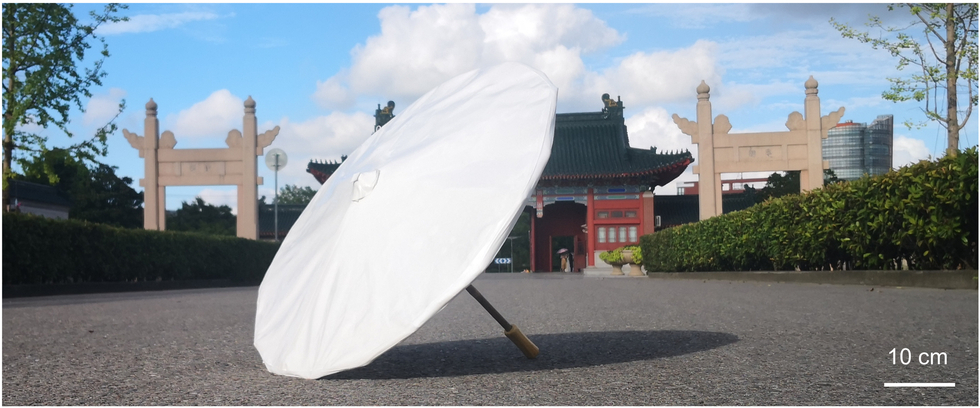 an umbrella made of al2o3 pdms hybrid films, suitable for both sunny and rainy days