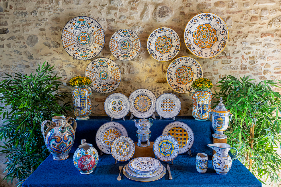 a table is filled with dishes
