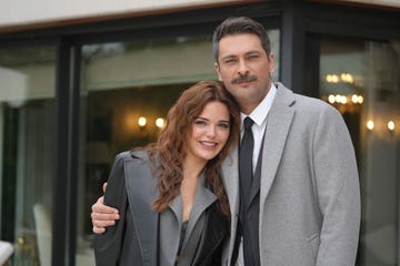 a man and woman posing for a picture