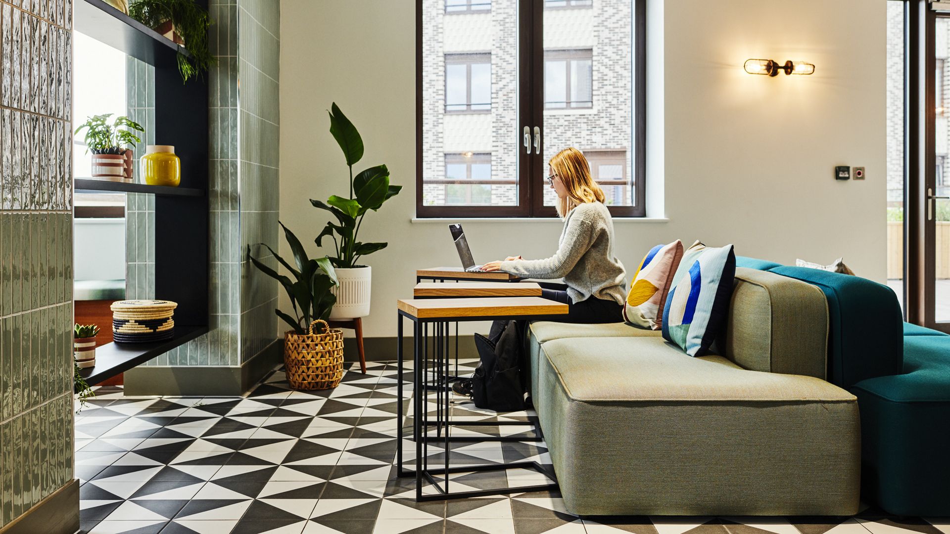 What are co-living spaces and how much do they cost?