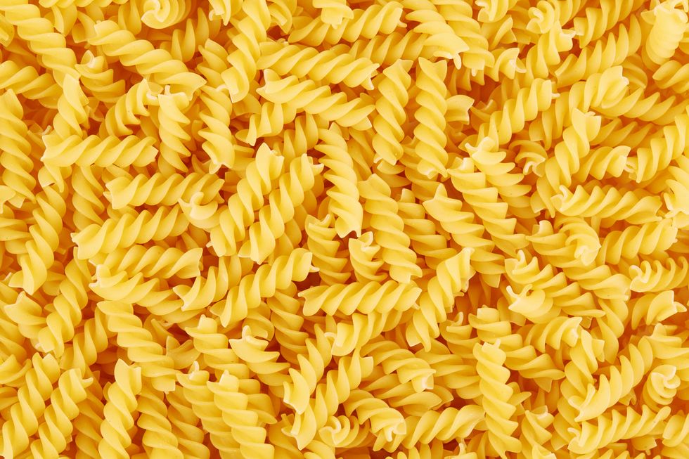 uncooked fusilli pasta background