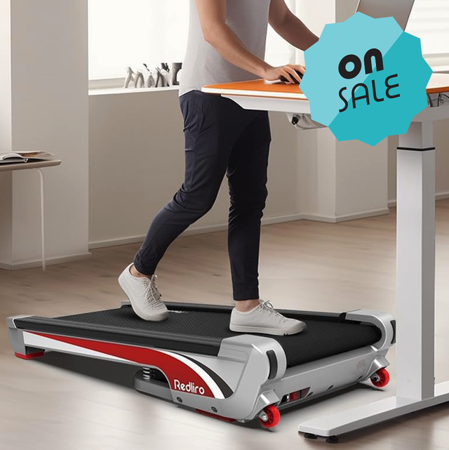 a person walking on a walking pad under a desk, on sale