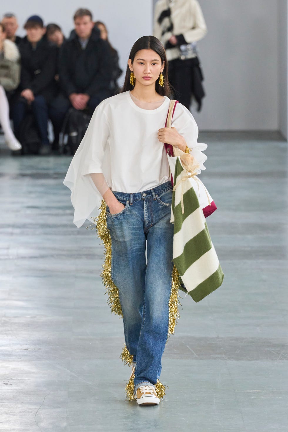 a person walking down a runway