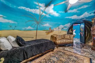 domed room with beach mural