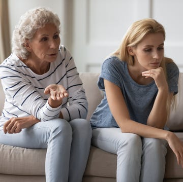 Unhappy woman grandkid getting distracted from scolding grandma avoiding conflict unhappy woman grandkid getting distracted from scolding grandma avoiding conflict