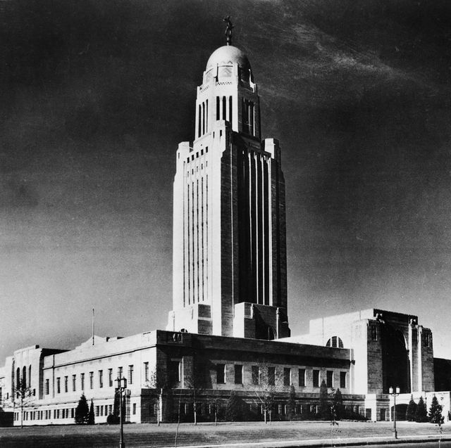 the nebraska state capitol building bertram grosvenor  goodhue, 1932 as seen from the street, lincoln, nebraska, 1930s the statue on the top of the tower dome is called 'the sower' and represents nebraska's great agricultural bounty and tradition nebraska is the only state in the union to have a unicameral legislature photo by bert soibelmanfrederic lewisgetty images