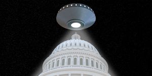 flying saucer above capitol building in a beam of light
