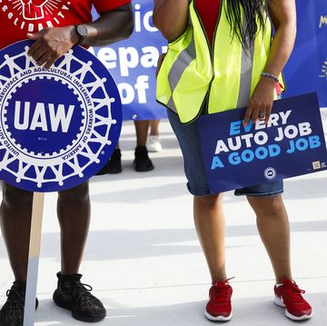united auto workers members march in detroit labor day parade