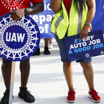 united auto workers members march in detroit labor day parade