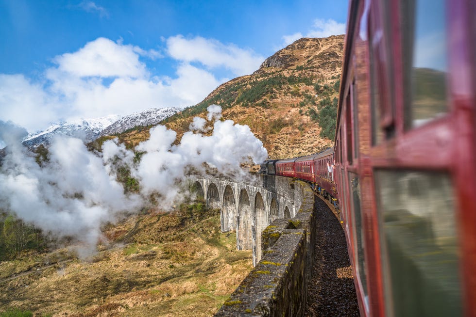 united kingdom, scotland, highland, glenfinnan, a830, glenfinnan viaduct, steam train passing viaduct