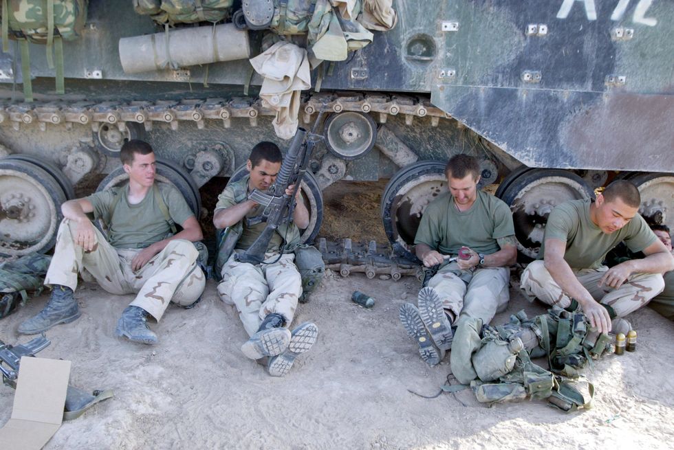 United States Marines from Task Force Tarawa relax