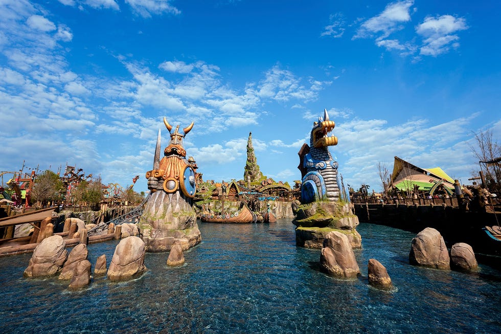 a wide shot overview of the how to train your dragon isle of berk area of epic universe
