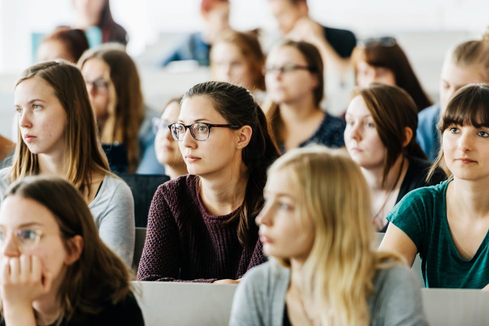 university students attending lecture