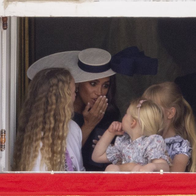 meghan markle with savannah phillips and mia tindall in the  major general's office overlooking the trooping of the colour on horse guards parade