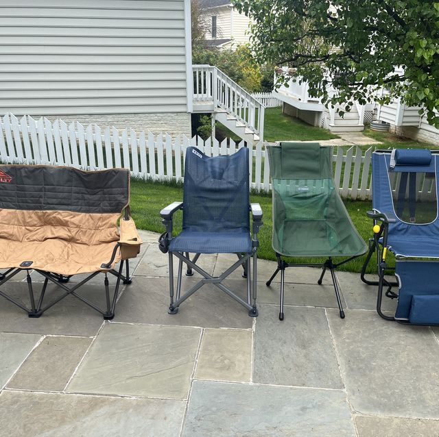 a group of camping chairs in a backyard, kelty, yeti, helinox and gci