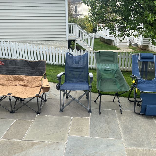 a group of camping chairs in a backyard, kelty, yeti, helinox and gci