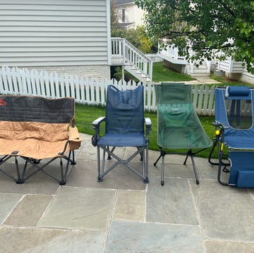 testing the best camping chairs a group of camping chairs outside in backyard from brands kelty, yeti, helinox and gci