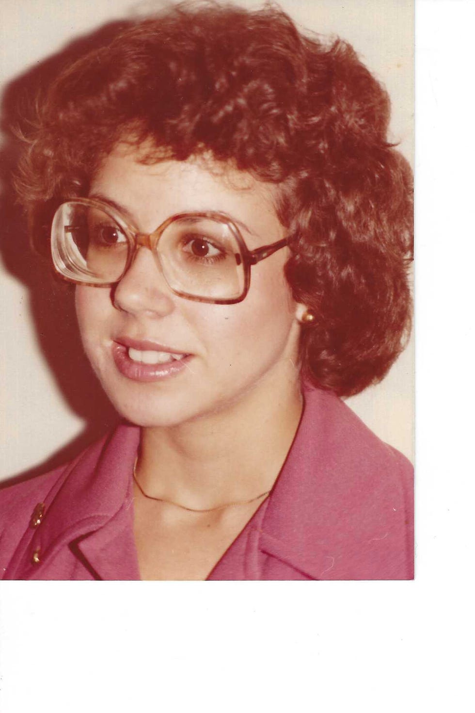 a woman wearing glasses