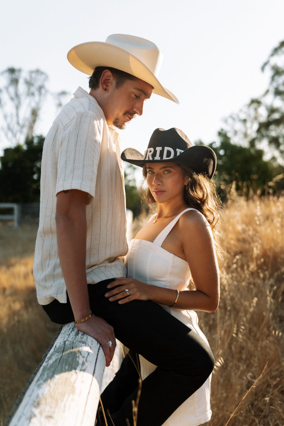 a man and woman posing for a picture