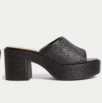 two pairs of stylish platform mules in light and dark colors two pairs of stylish platform mules in light and dark colors