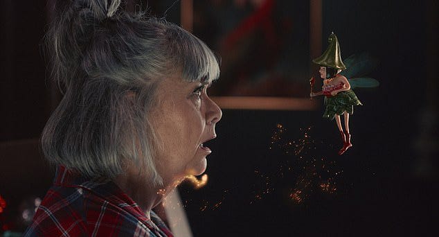 a woman with gray hair gazes at a small colorful fairy floating nearby