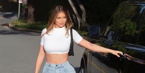 premium exclusive kylie jenner takes a break from quarantine to pick up some essential itemsthe 22 year old billionaire was pictured in beverly hills wearing the n95 face mask to protect herself from the covid 19 pandemickylie wore a cute white crop top showing off her incredible figure and a pair of light blue denim 'vera wang' jeans with nike air force 1 sneakers kylie has just paid 365 million for a massive 19,250 square foot mansion in the upscale holmby hills neighborhood in the west side of los angeles 24 apr 2020 pictured kylie jenner photo credit mega themegaagencycom 1 888 505 6342 mega agency tagid mega652727001jpg photo via mega agency