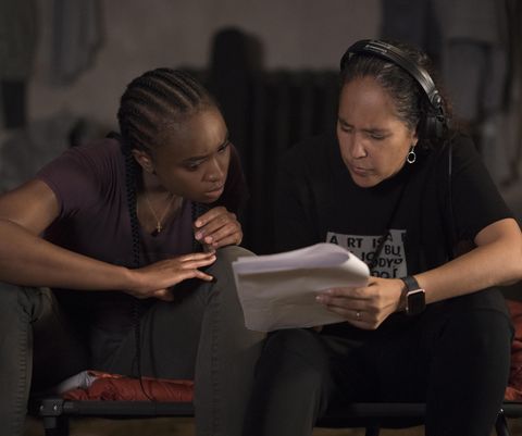 the old guard l to r kiki layne, director gina prince bythewood on the set of the old guard cr amy spinksnetflix © 2020