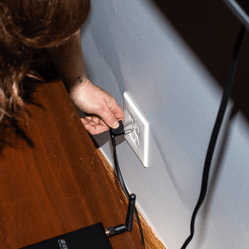 unplugging a cord from an outlet unplugging a cord from an outlet
