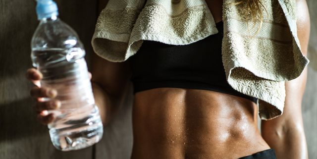 https://hips.hearstapps.com/hmg-prod/images/unrecognizable-athletic-woman-with-abdominal-royalty-free-image-1748014831.pjpeg?crop=1.00xw:0.752xh;0,0.166xh&resize=640:*