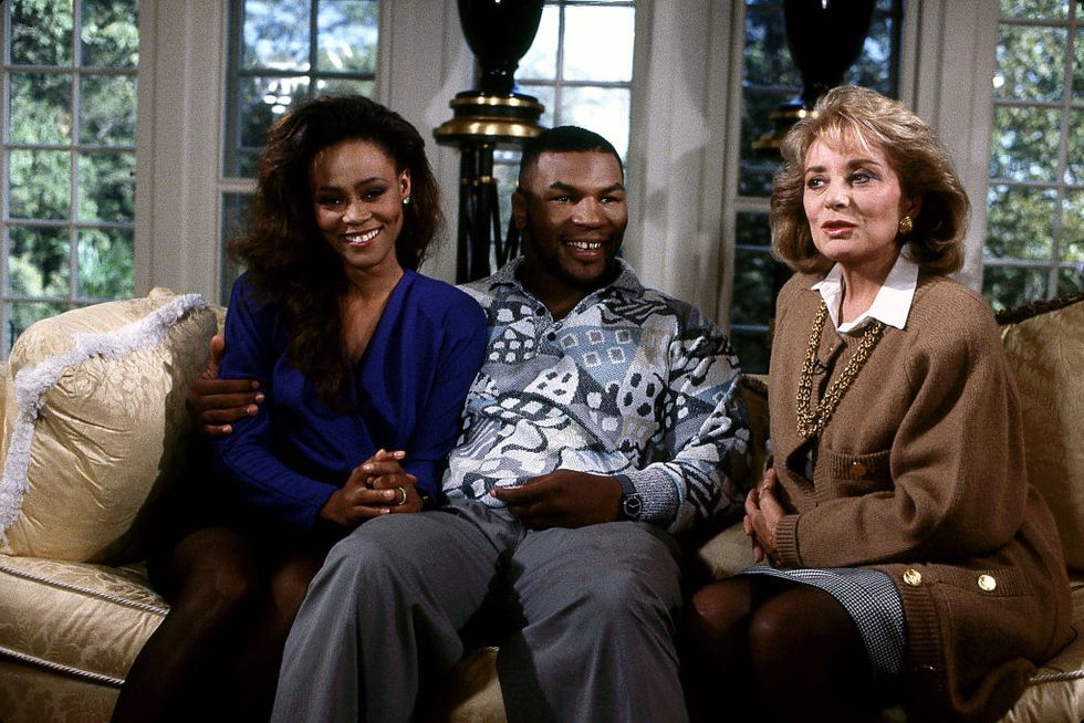mike tyson robin givens and barbara walters sitting on a couch