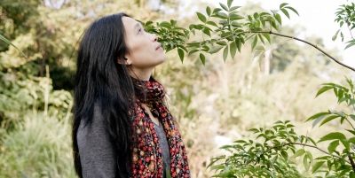 People in nature, Botany, Outerwear, Leaf, Plant, Neck, Tree, Long hair, Textile, Dress, 