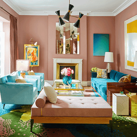 Formal living room with plaster coloured walls and turquoise upholstery