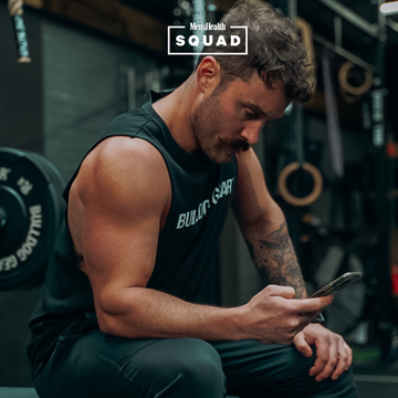 man in gym on phone