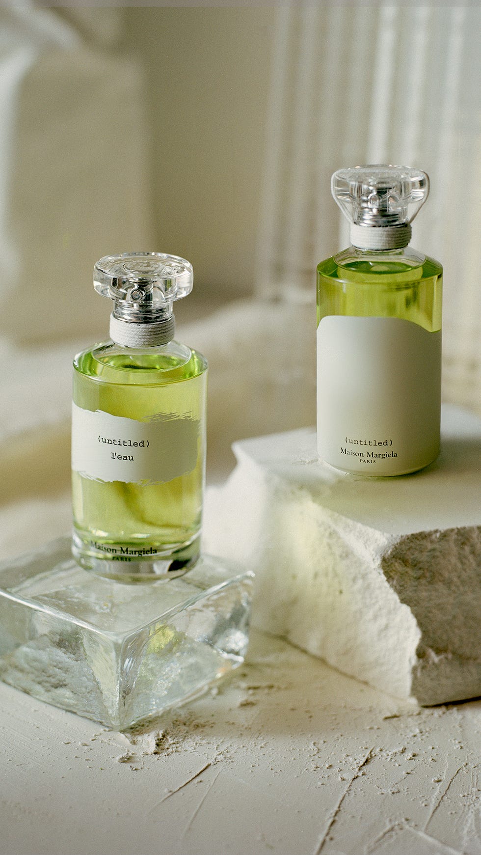 a couple of glass bottles on a counter