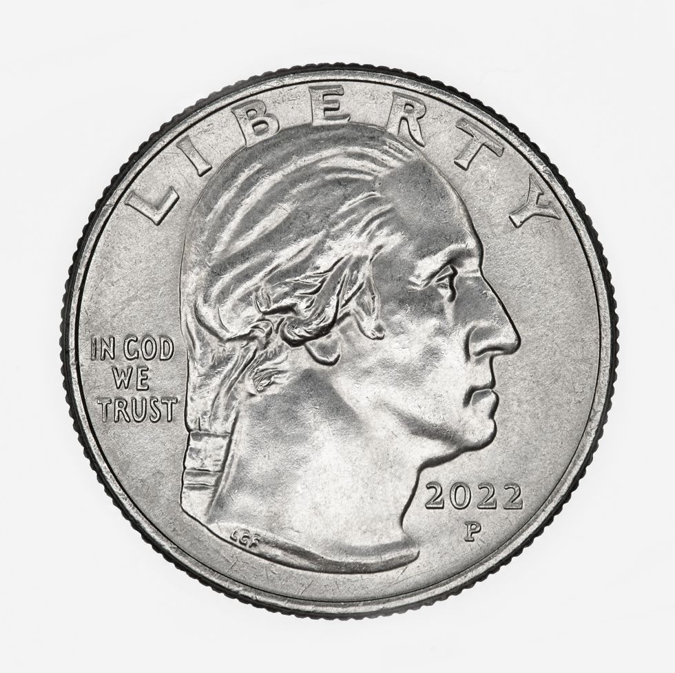 a silver coin displays an engraved portrait of george washington facing right, inscriptions read liberty and in god we trust