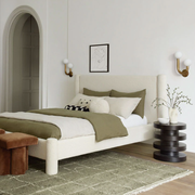 upholstered bed in boucle fabric