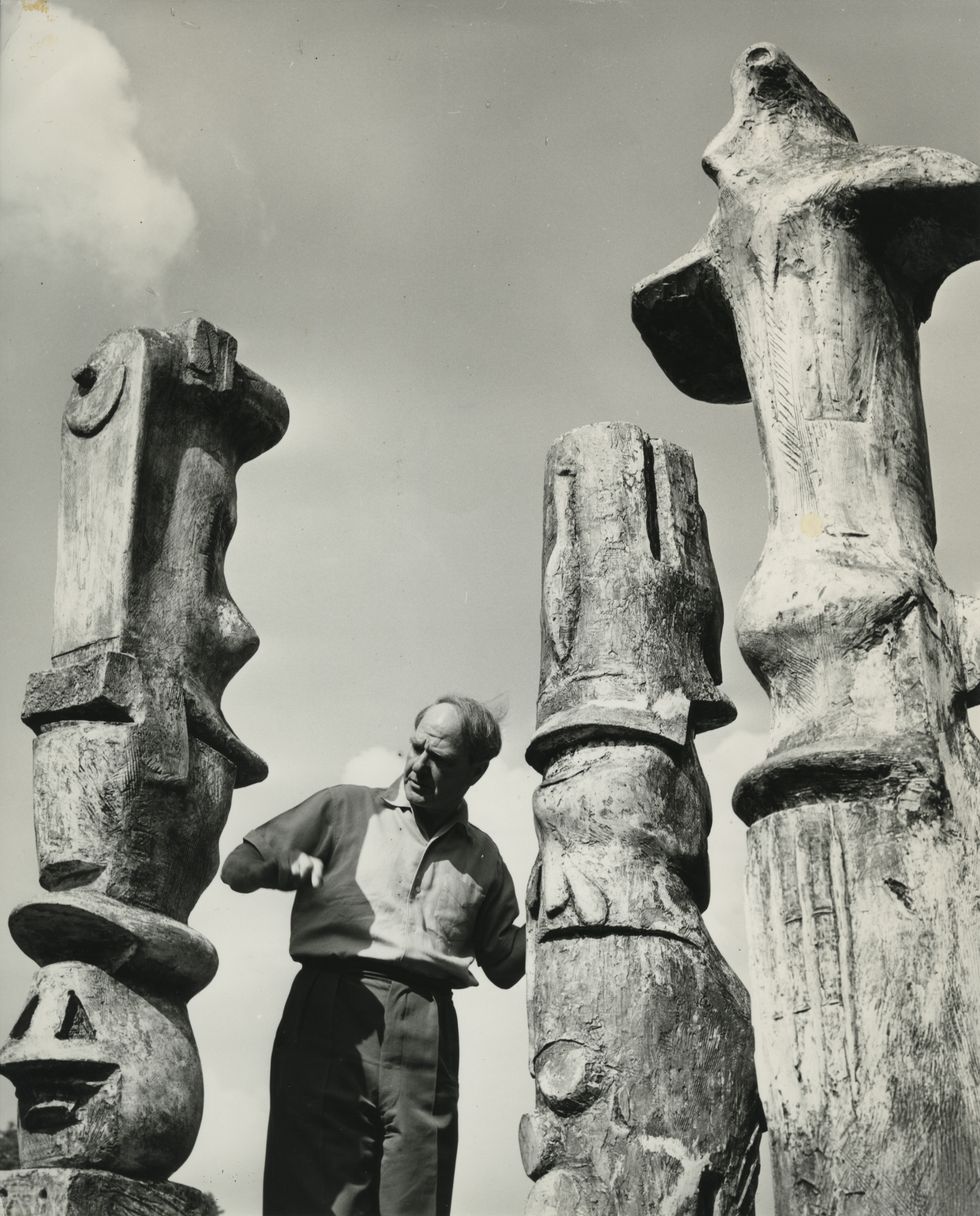 henry moore with three of his upright motives c1955 
courtesy the henry moore foundation and hauser wirth