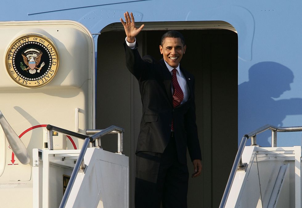Barack Obama: President Obama waves to the crow as he leaves Osan, South Korea. Osan was the final destination on his first tour of Asia as President.