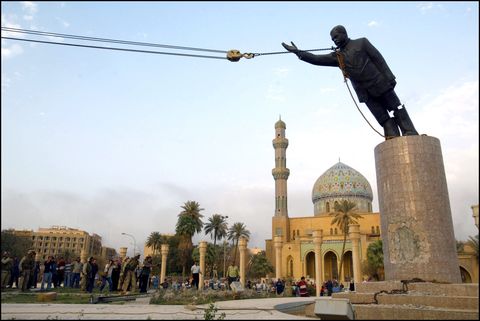 operation iraqi freedom   day 21 us troops enter central baghdad and topple statue of saddam hussein on april 9, 2003 in baghdad, iraq