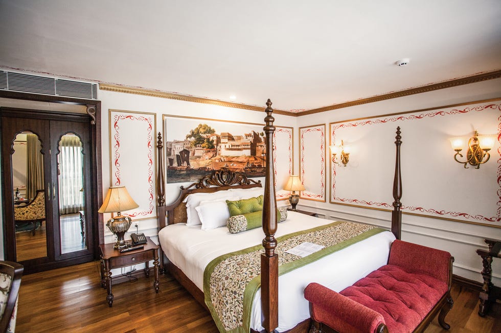 elegant hotel bedroom with traditional decor and furnishings